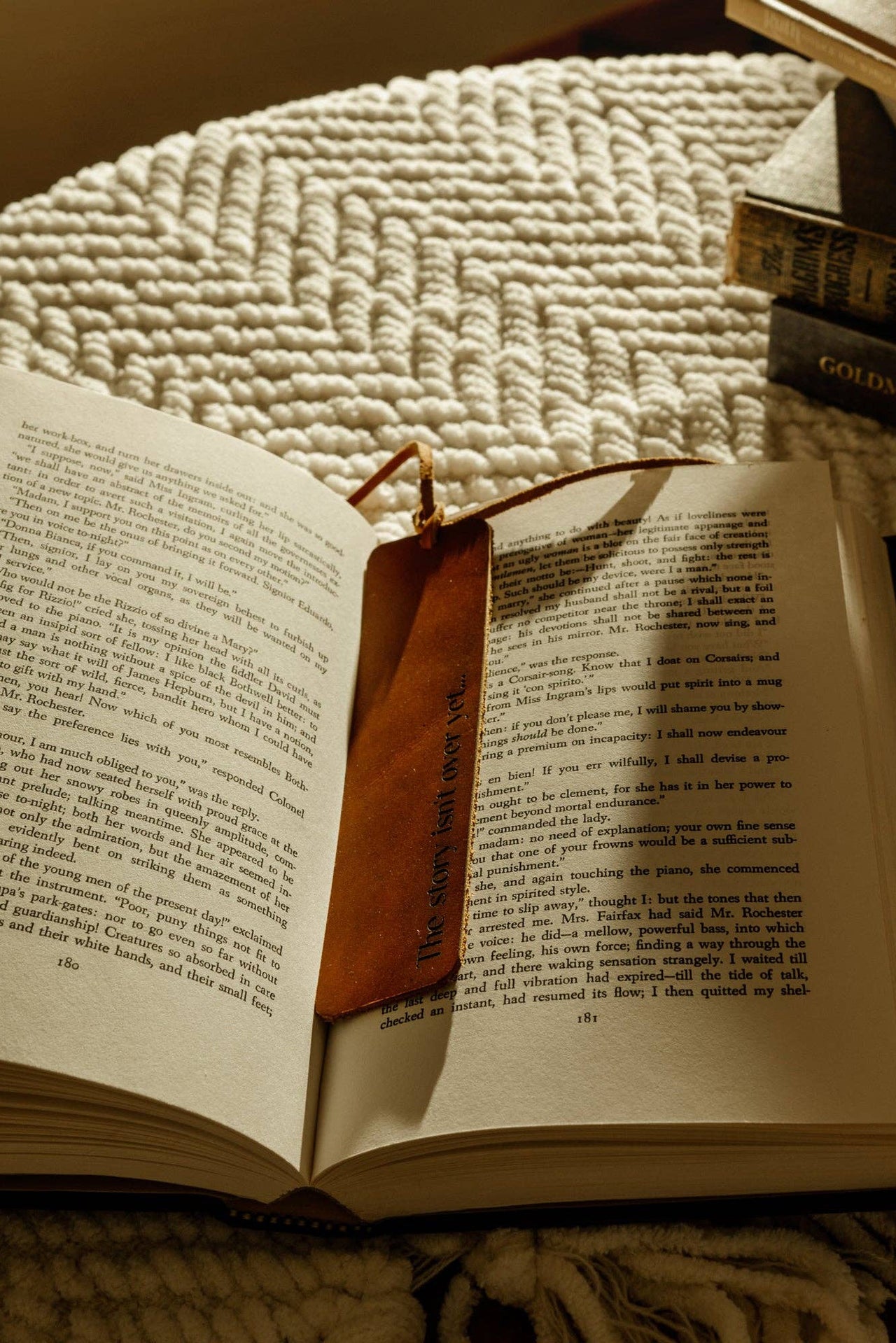 Leather Bookmark: "The story isn't over yet"