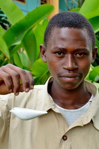 Thumbnail for Rwandan artisan displaying hand-made oranament